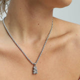 Réalta pavé bear pendant necklace in silver stainless steel worn on a delicate rope chain